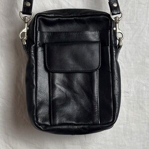 Winn International Black Leather Crossbody Travel Pouch with Detachable Strap